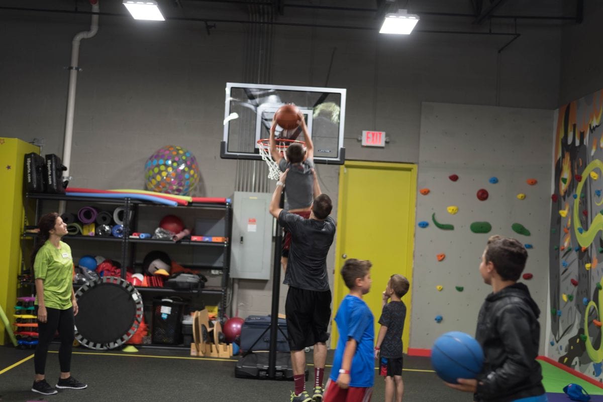Playing basketball at Fitwize kids gym