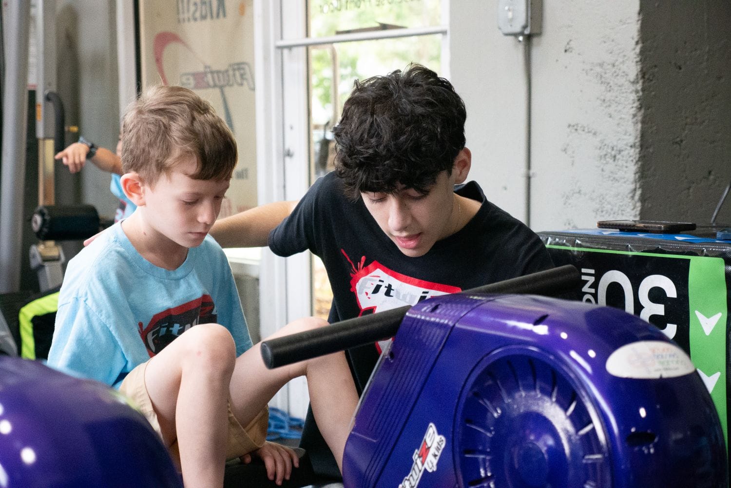 Kid Exercising on machine for Physical Development
