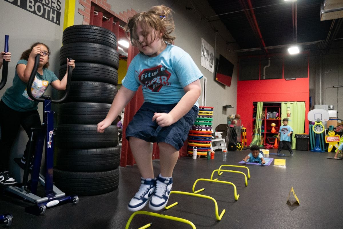 Kids working through an obstacle course inside of a kids' gym in Coral Springs FL